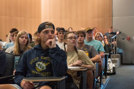 Students Attend Class in Reynolds Hall Auditorium 