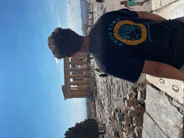 Tino Kayafas, entrepreneurship student and owner of Philotimo Enterprises, poses in Greece