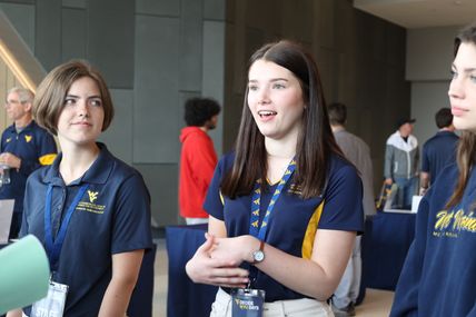 Chambers College Student Ambassadors talk to potential business students during Decide WVU in April 2023
