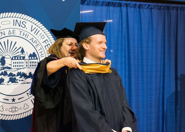 Photo of Ian Thayer at graduation